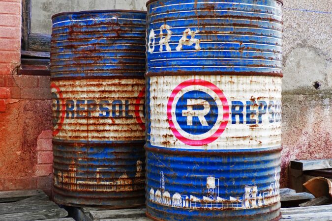 two oil drums on a pallet.