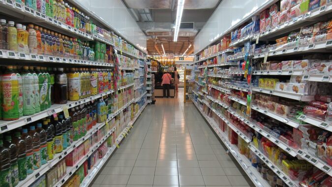 supermarket aisle selling food.