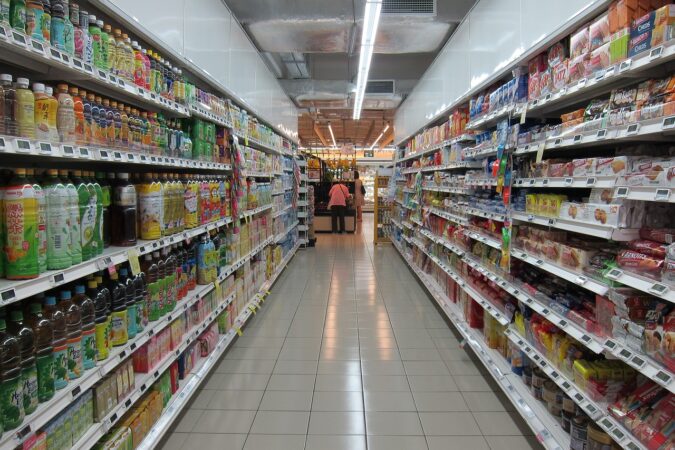 supermarket aisle selling food.